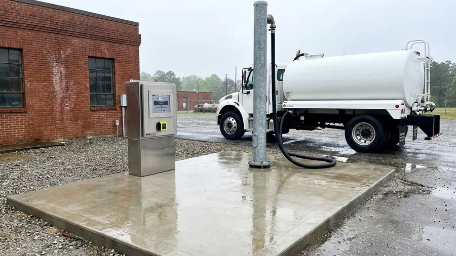 PRO-TECH cashless bulk water station panel installed in a municipal utility yard